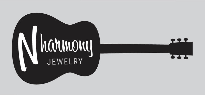 N Harmony Jewelry handmade guitar string bracelets, earrings, and necklaces displayed with music inspired styling