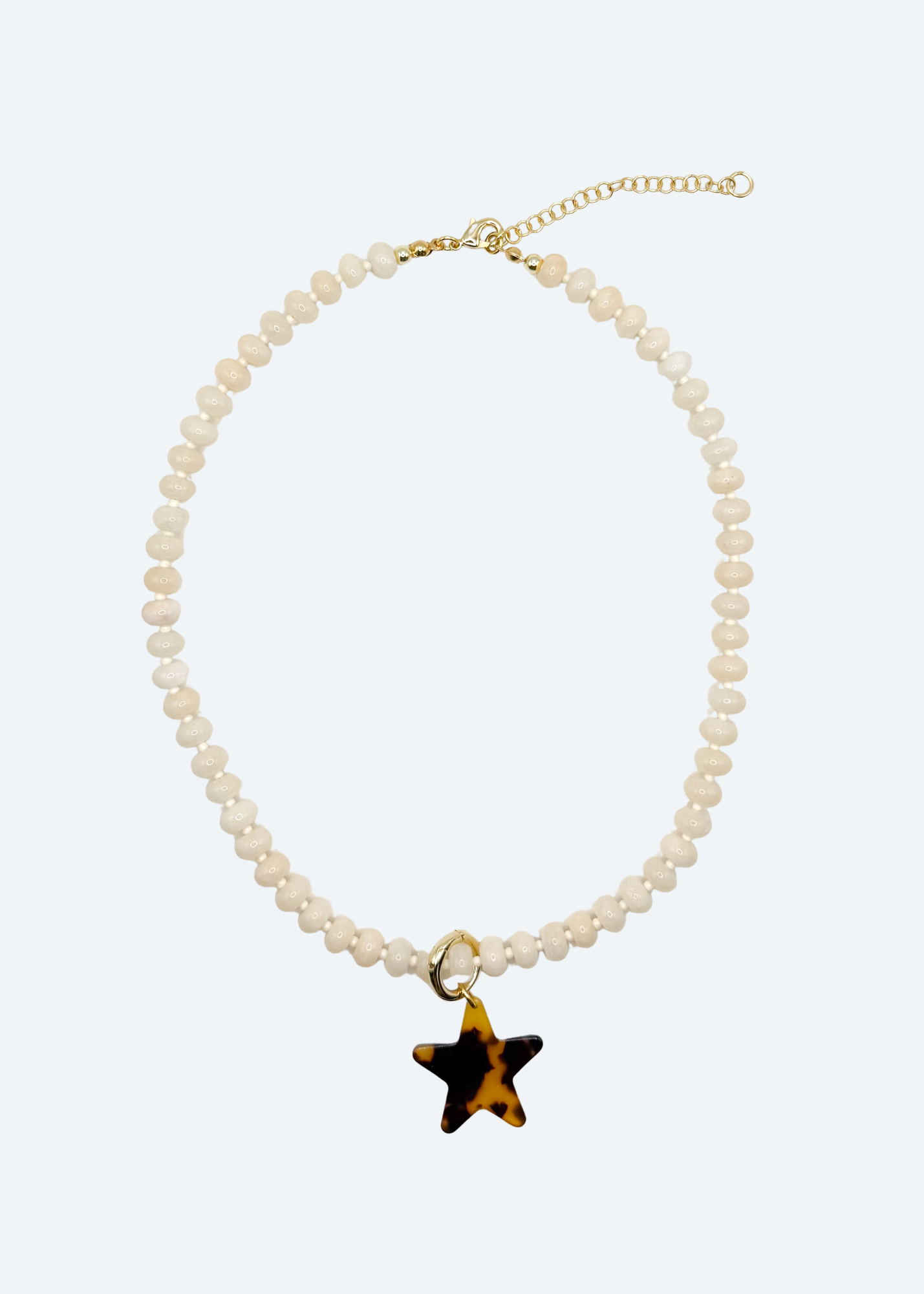 The Cleo Beige Beaded Star Charm Necklace by London Crafted