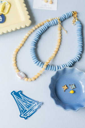 The Soleil Yellow Beaded Pearl Necklace detail view by London Crafted