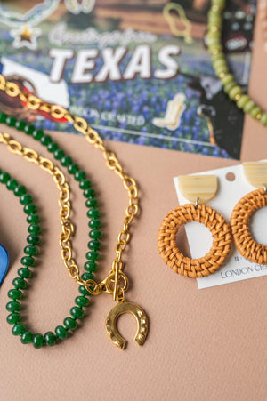 The Heritage Antiqued Gold Charm Necklace detail view by London Crafted