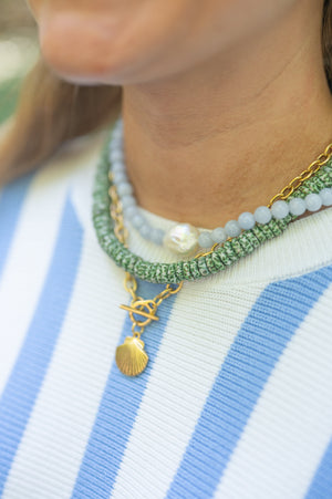 The Heritage Antiqued Gold Charm Necklace detail view by London Crafted
