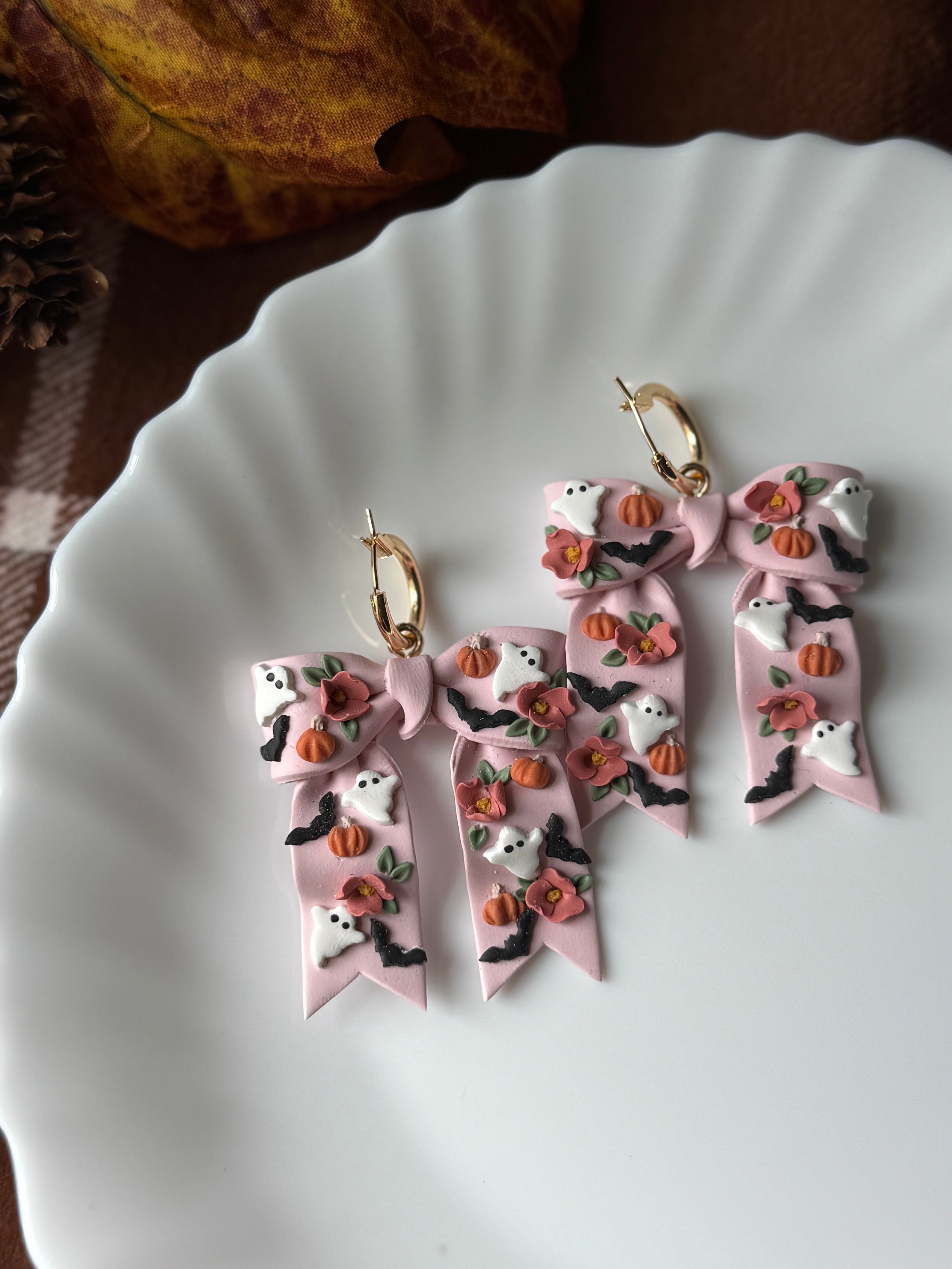 Pink October Bows handmade polymer clay earrings by Shop Something Earthy — view 1 of 2