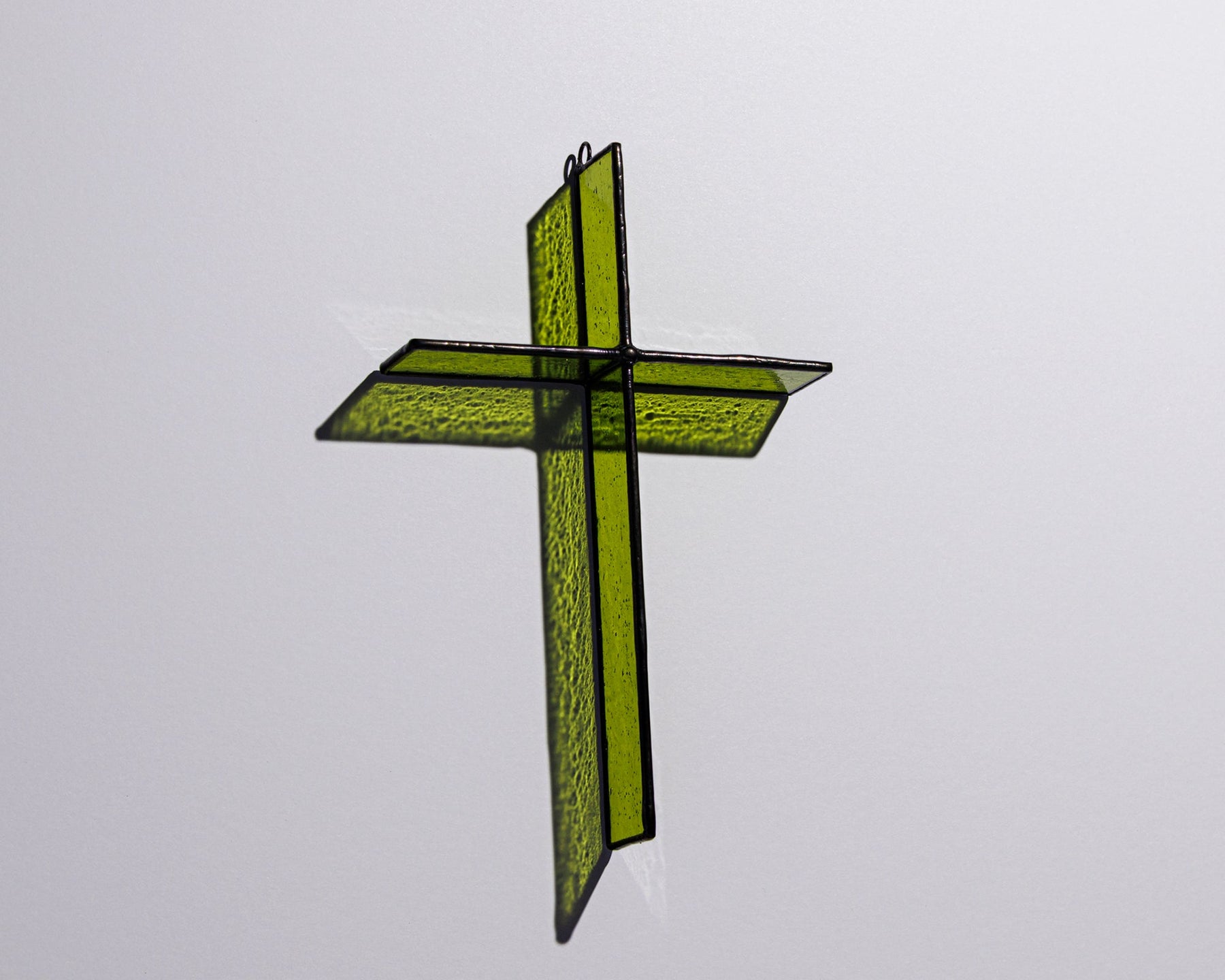 Alternate view of Bottle Green Cross Suncatcher with real stained glass and black patina