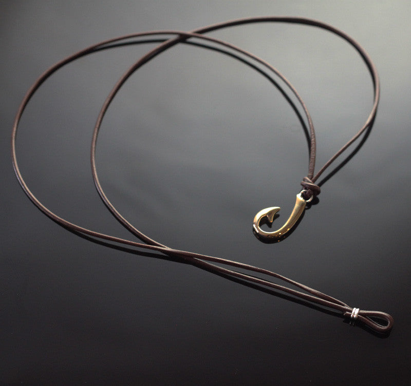 Two Way Small Bronze Hook Necklace on Double Leather detail view by Anisa Jewelry