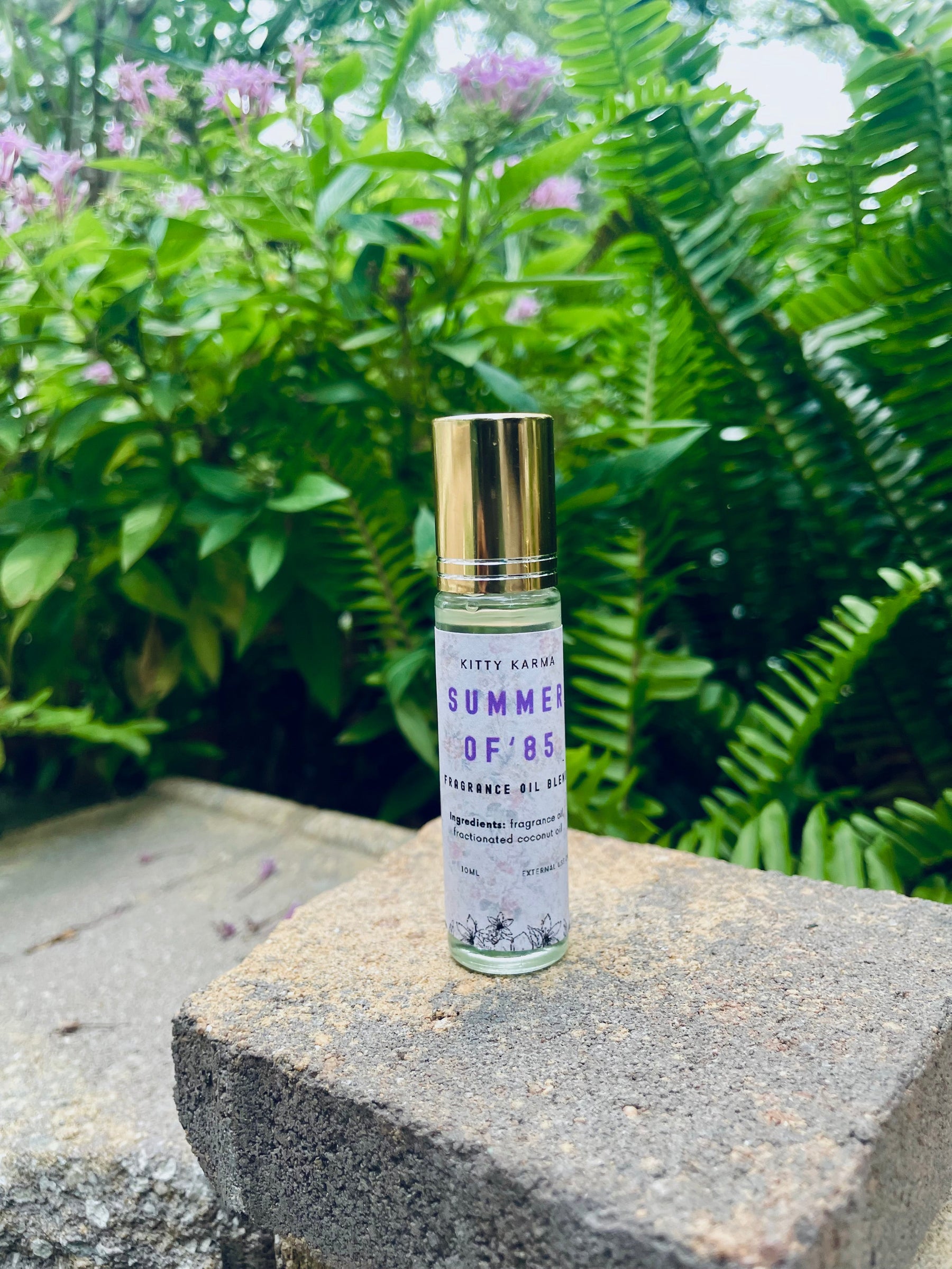 Detail view of Kitty Karma Studio Summer of '85 perfume roller packaging