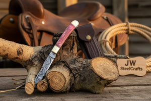 Backwoods Trapper Knife Two Blade Pink Bone Handle Steel Bolster Slip Joint detail view by JW SteelCrafts