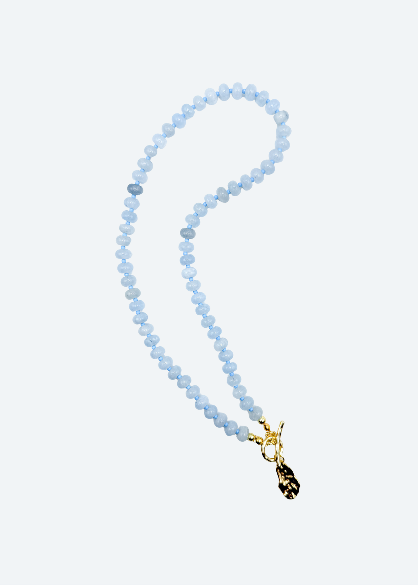 The Lana Blue Beaded Oyster Shell Charm Necklace by London Crafted