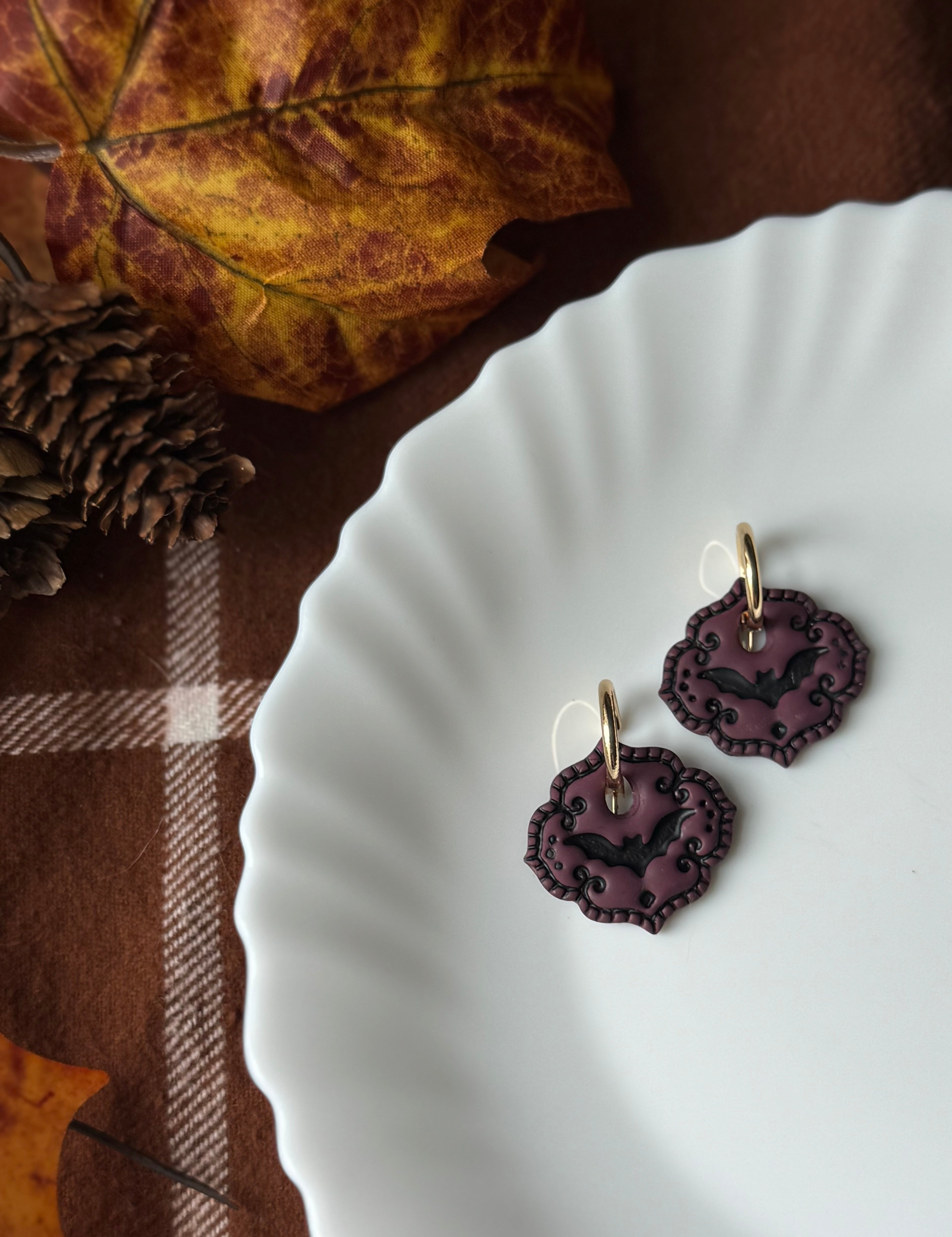 Bat Cameo Plum handmade polymer clay earrings by Shop Something Earthy — view 1 of 2
