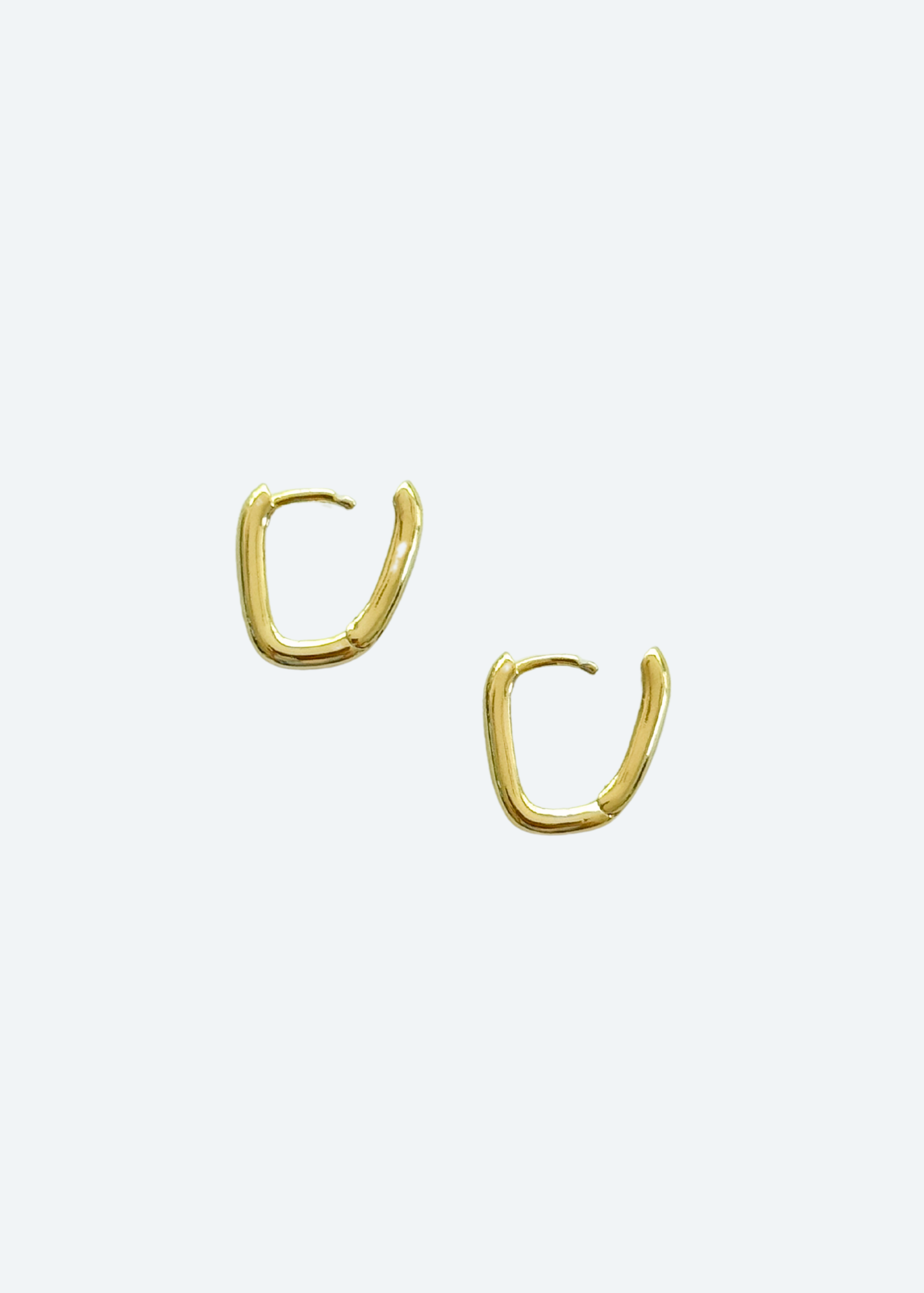 The Stella Mini Gold Rectangle Huggie Earrings detail view by London Crafted