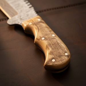 Ramhorn Damascus Wilderness Tracker with Extended Sawback Blade