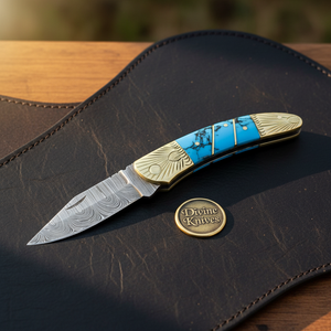 Engraved Brass Bolster Damascus Folder with Turquoise Scales and Sharpening Rod