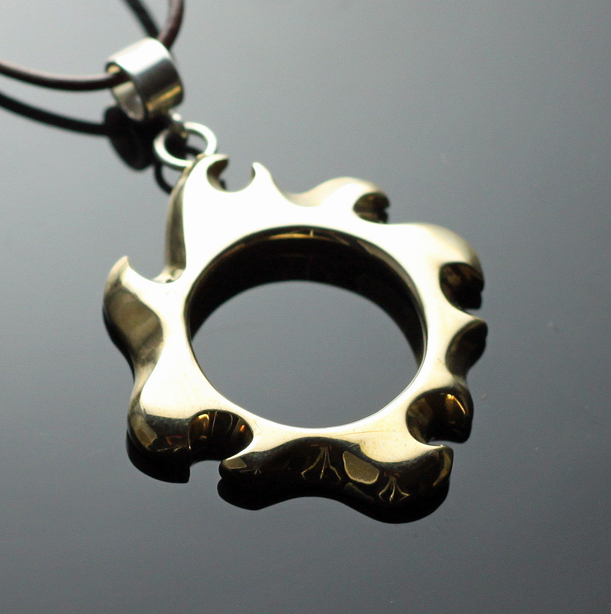 Bronze Sun and Waves Pendant with Sterling Silver Bail by Anisa Jewelry