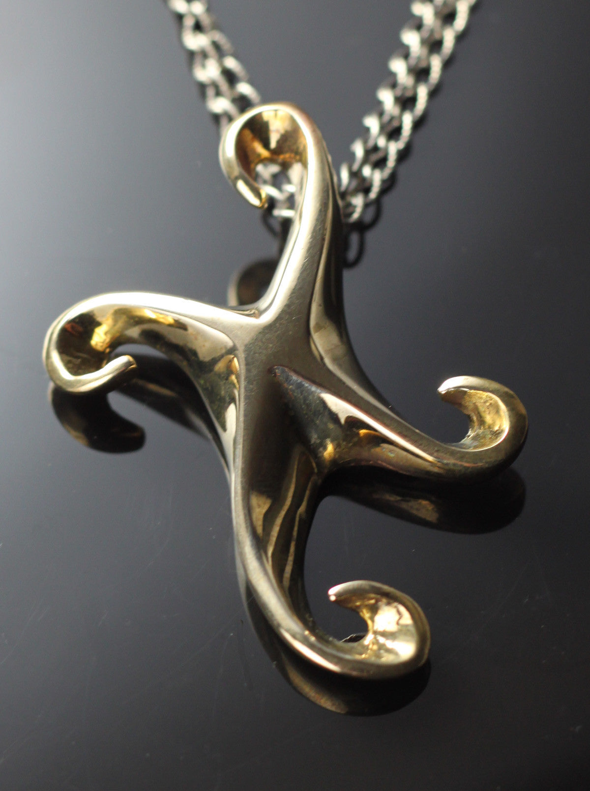 Bronze Curvy Mermaid Cross Pendant on Leather Cord by Anisa Jewelry