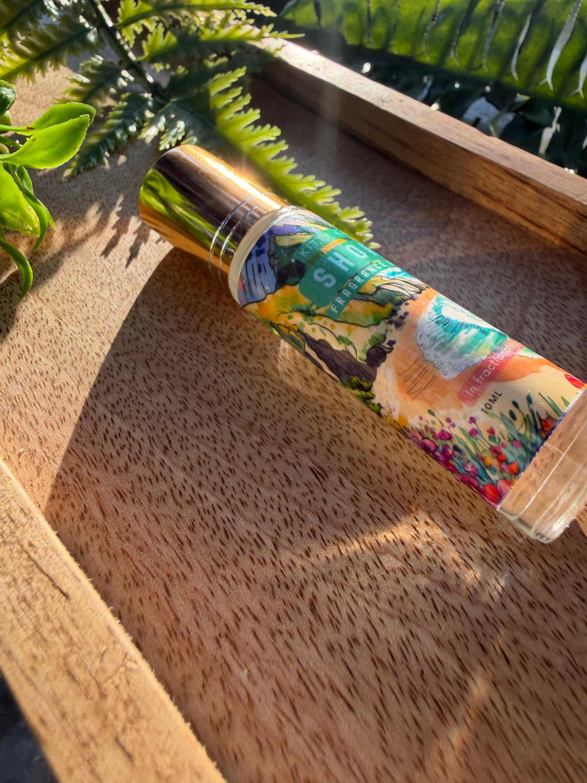 Detail view of Kitty Karma Studio Shores perfume roller packaging