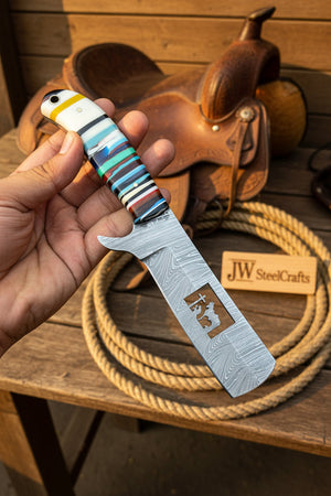 Damascus Bull Cutter Knife — Multi-Color Rainbow Resin Handle, Christian Cross Blade Engraving, Steel Bolster & Lanyard Hole