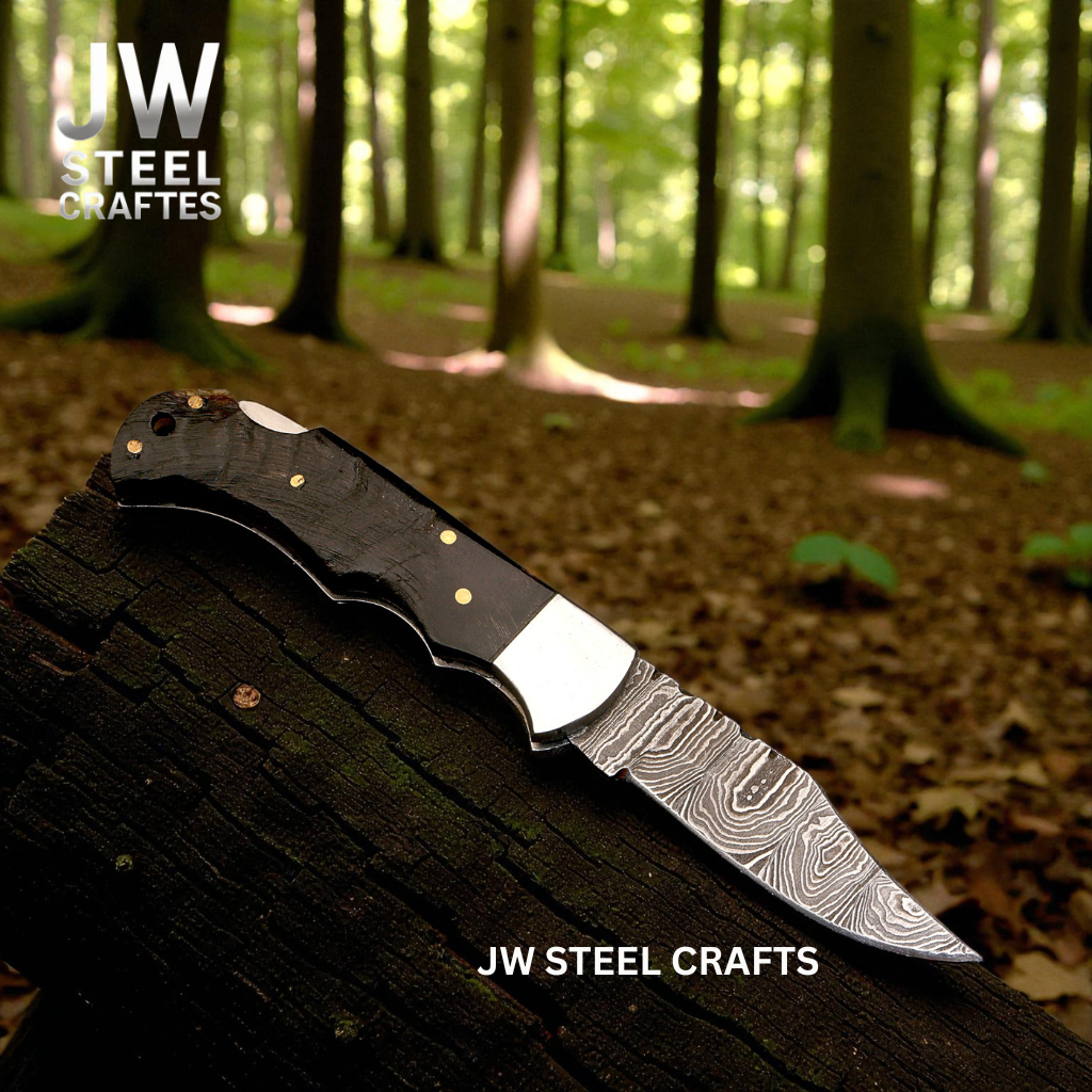 American Flag Damascus Folding Hunter with Ram Horn Handle detail view by JW SteelCrafts