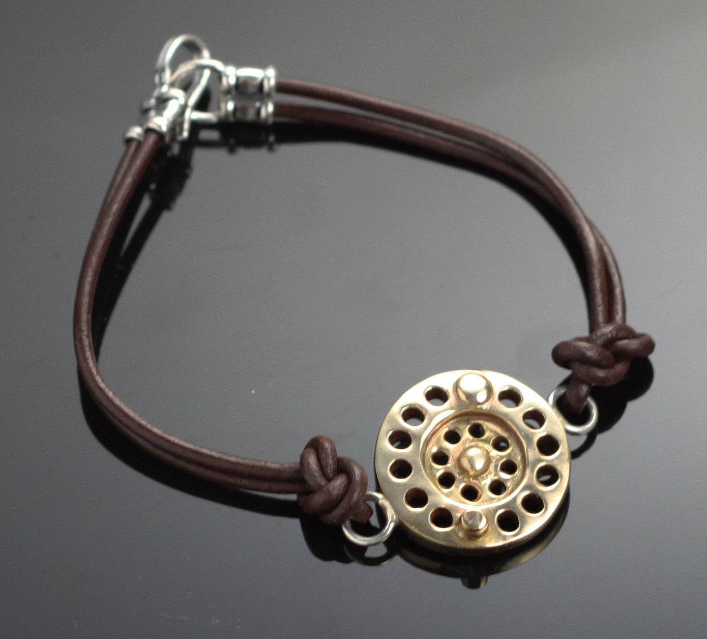 Bronze Fly Reel Bracelet on Double Leather by Anisa Jewelry