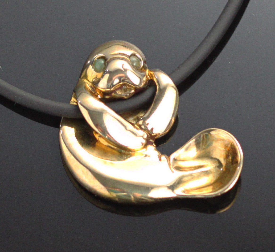 Bronze Hanging Manatee Pendant with Jade by Anisa Jewelry