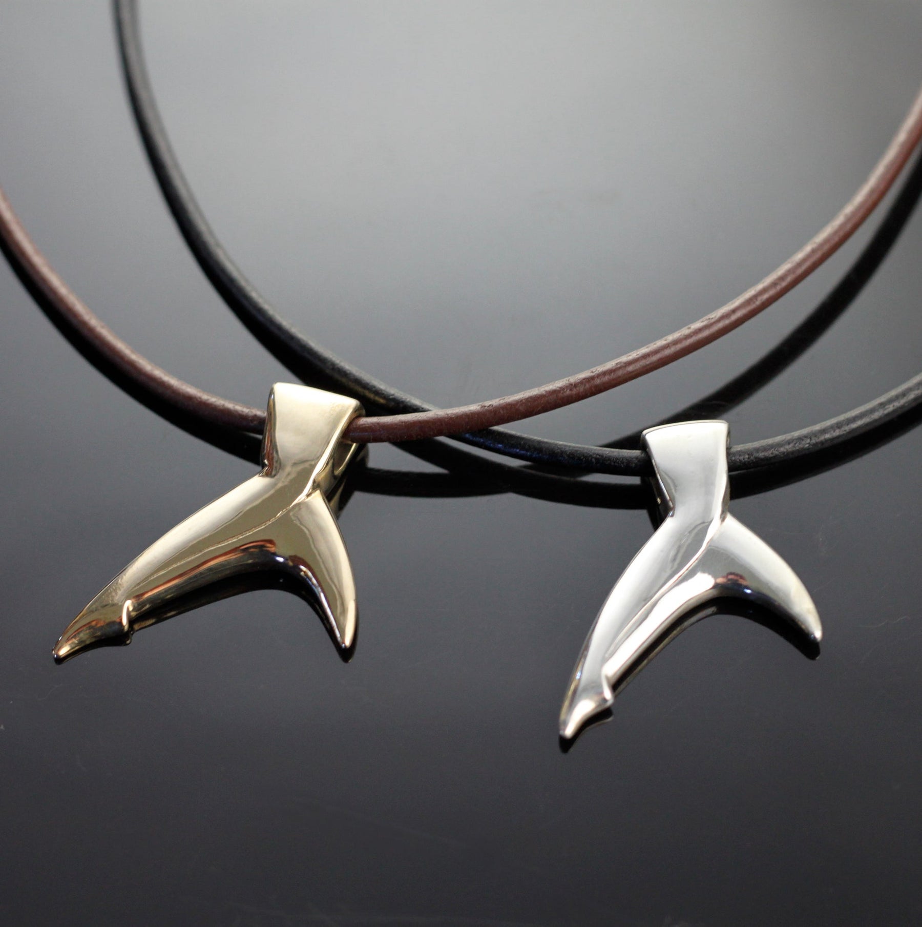 Bronze Black Tip Shark Tail Pendant on Brown Leather by Anisa Jewelry