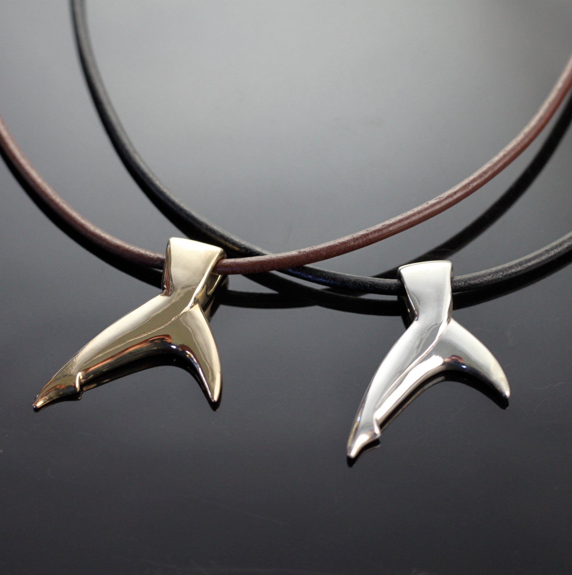 Bronze Black Tip Shark Tail Pendant on Brown Leather by Anisa Jewelry