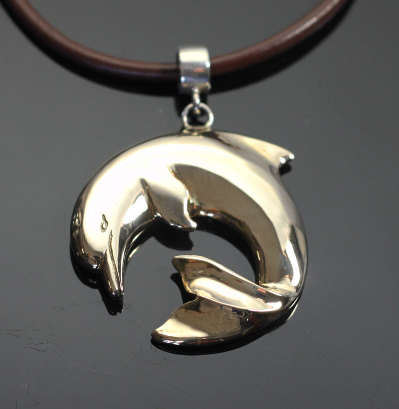 Bronze Curved Dolphin Pendant with Sterling Silver Bail by Anisa Jewelry