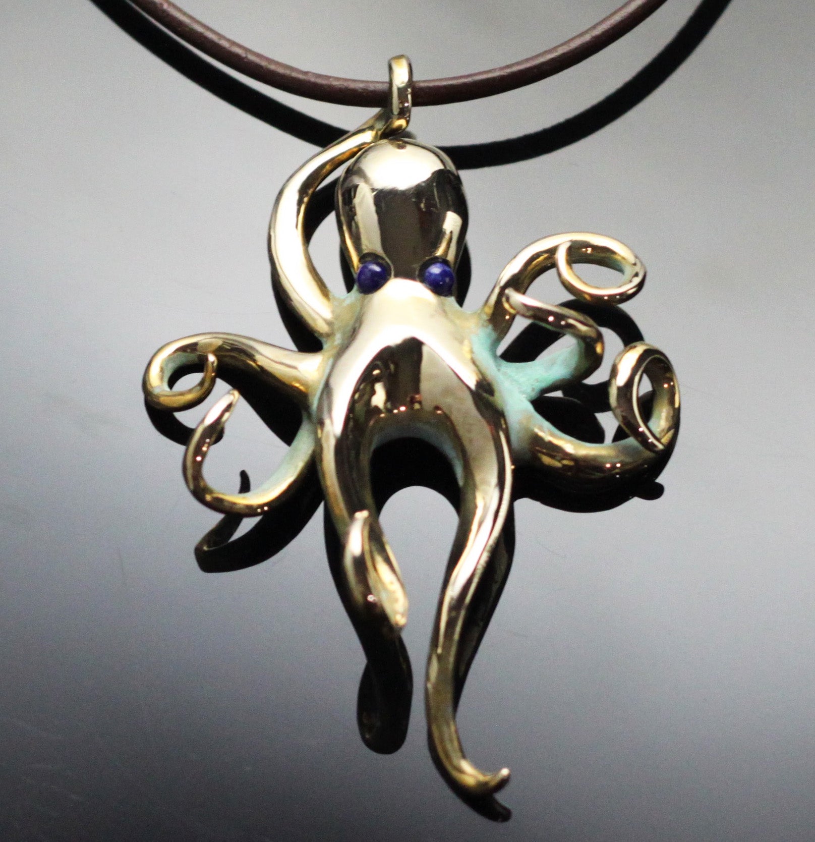 Large Bronze Octopus Pendant with Lapis Eyes by Anisa Jewelry