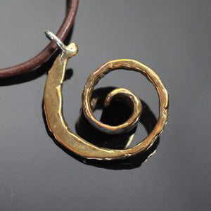 Large Bronze Spiral Pendant on Leather Cord by Anisa Jewelry