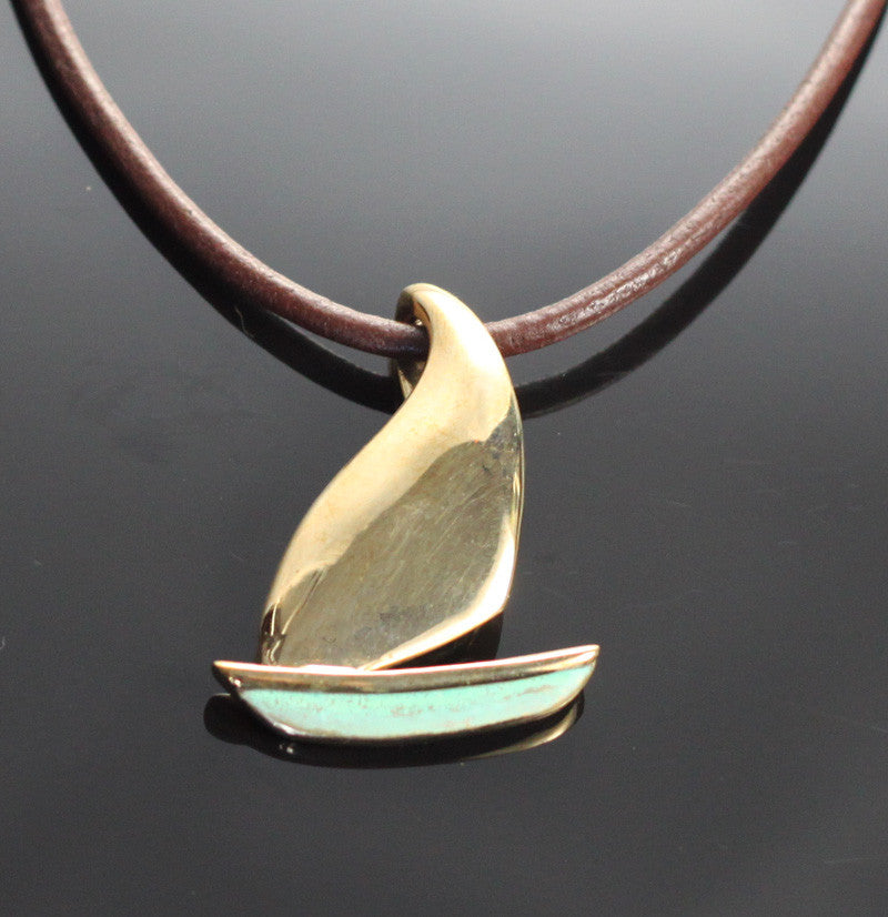 Bronze Sailboat Pendant on Leather Cord by Anisa Jewelry