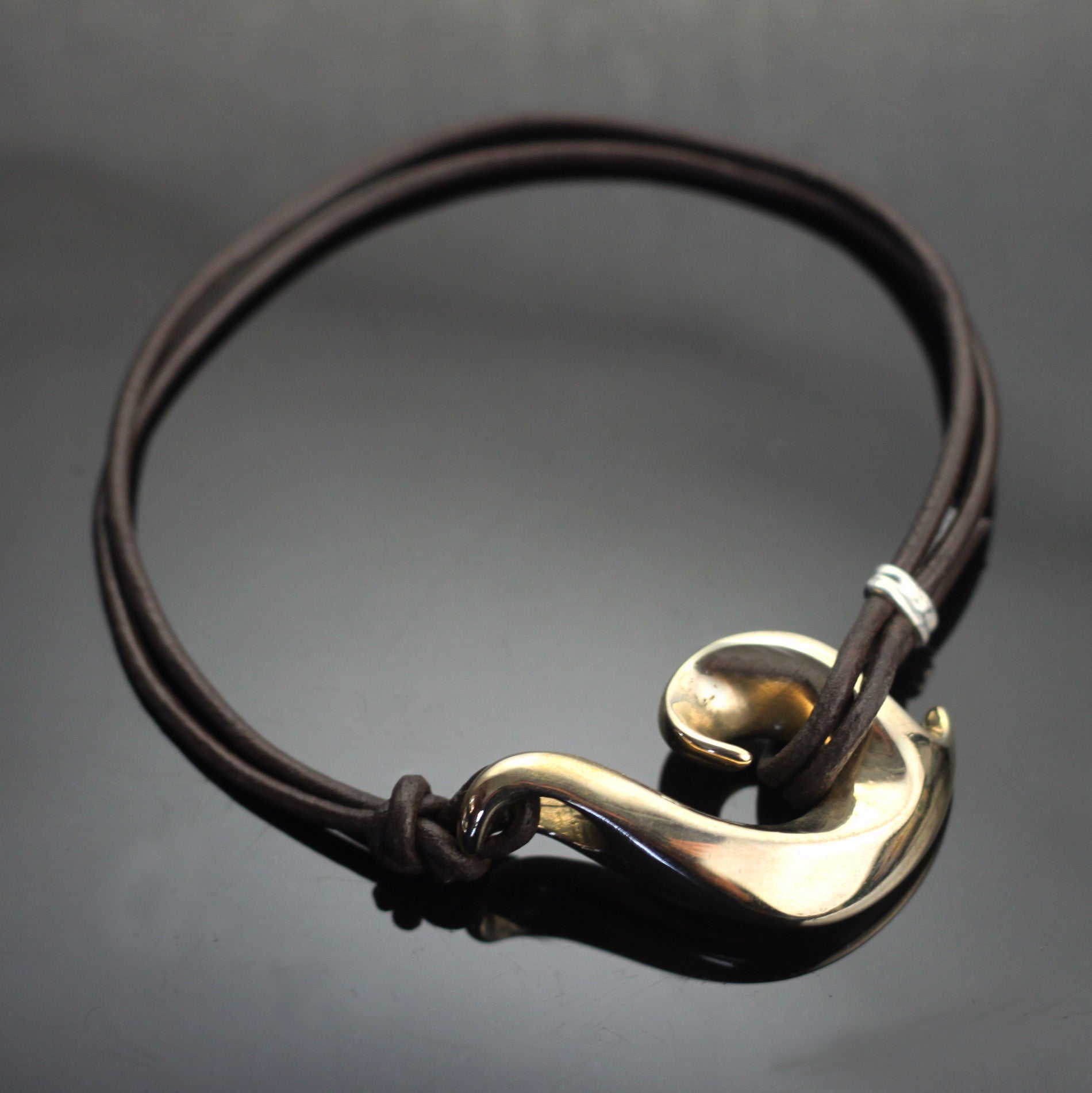 Small Bronze Wave Hook Bracelet on Double Leather by Anisa Jewelry
