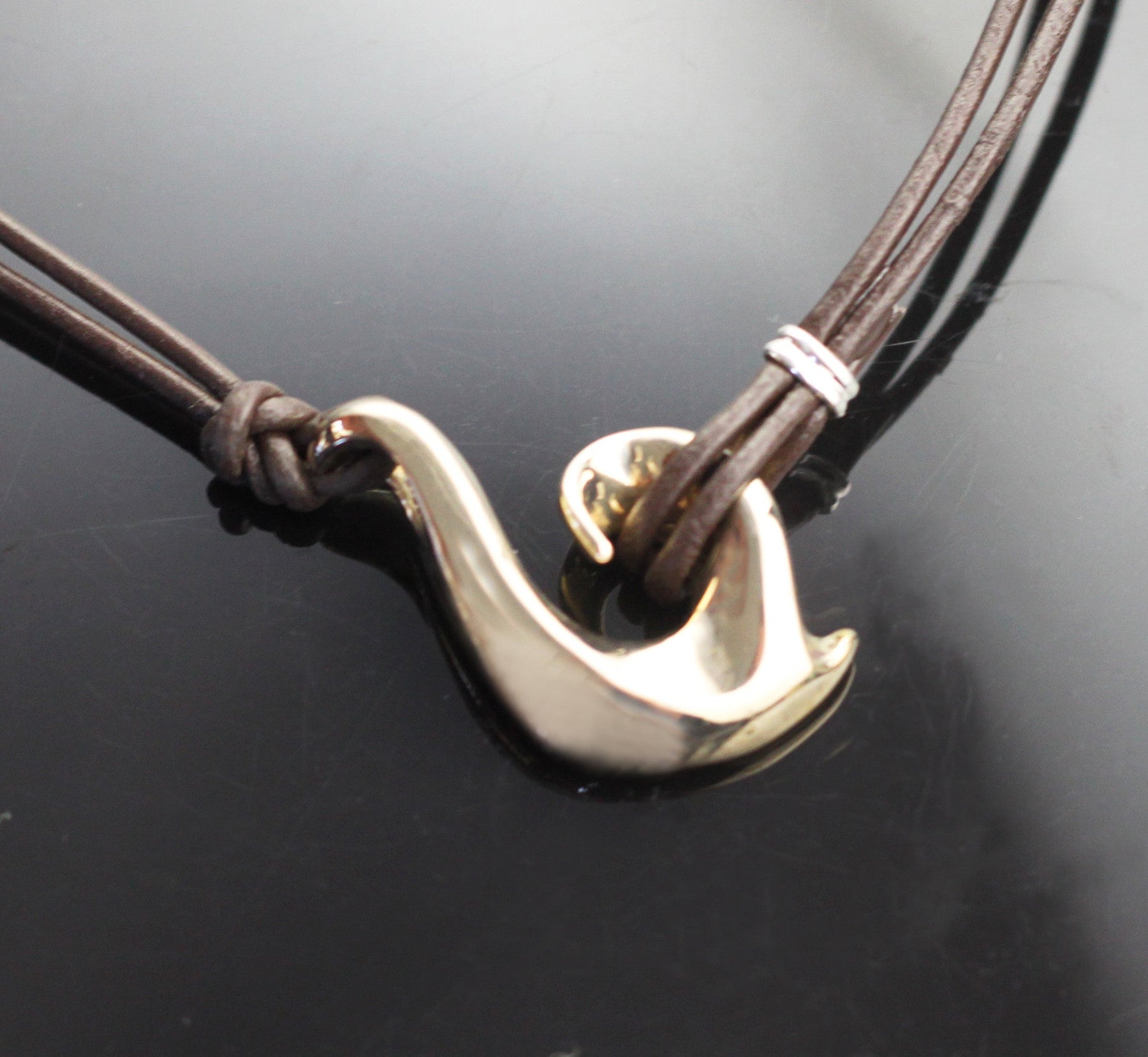 Small Bronze Wave Hook Necklace with Leather Loop Closure by Anisa Jewelry
