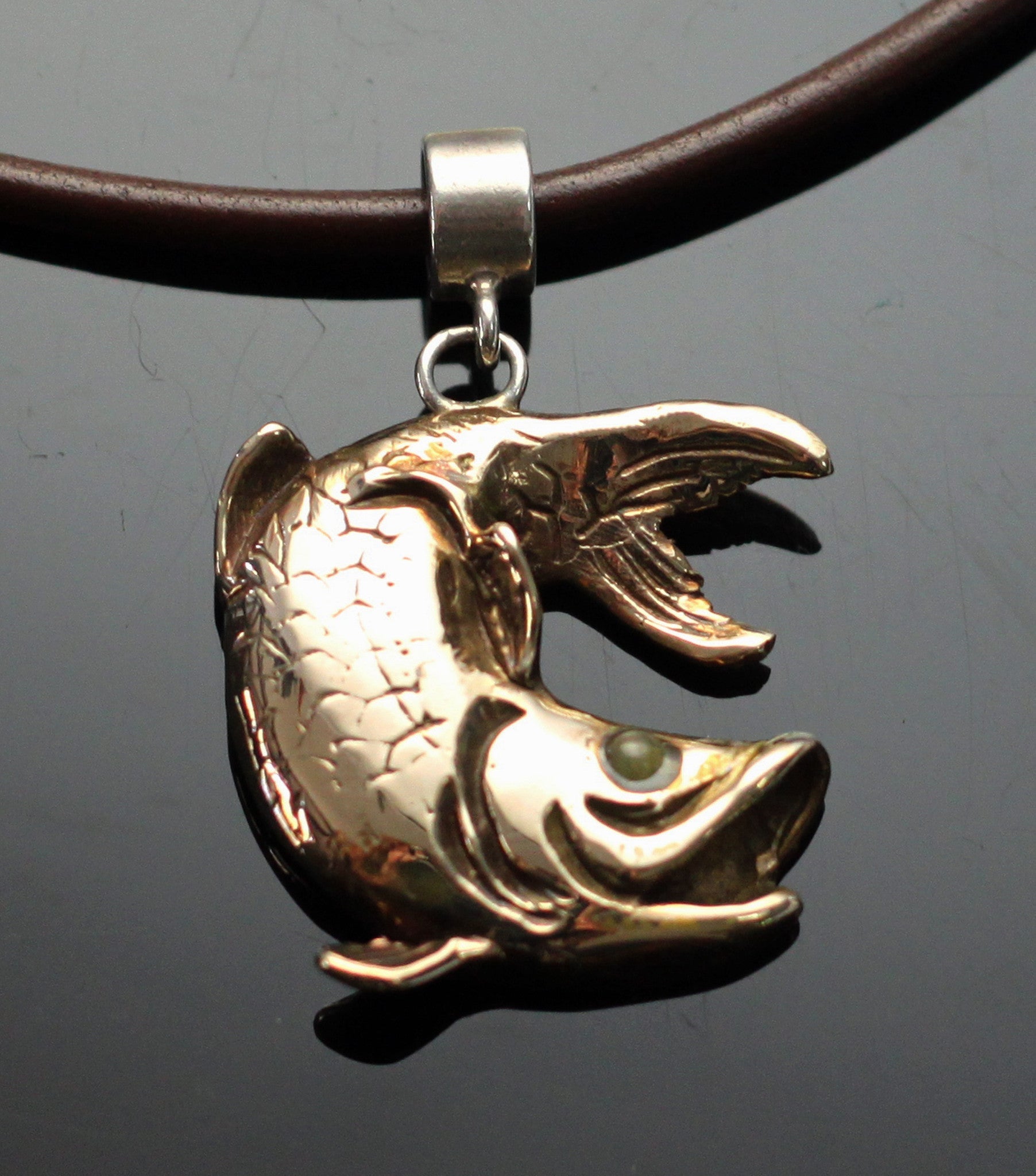 Bronze Curved Tarpon Pendant on Leather Cord by Anisa Jewelry