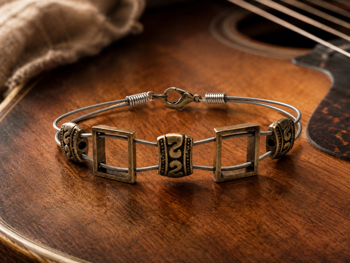 Men's brass guitar string bracelet by N Harmony Jewelry, handmade jewelry main product photo