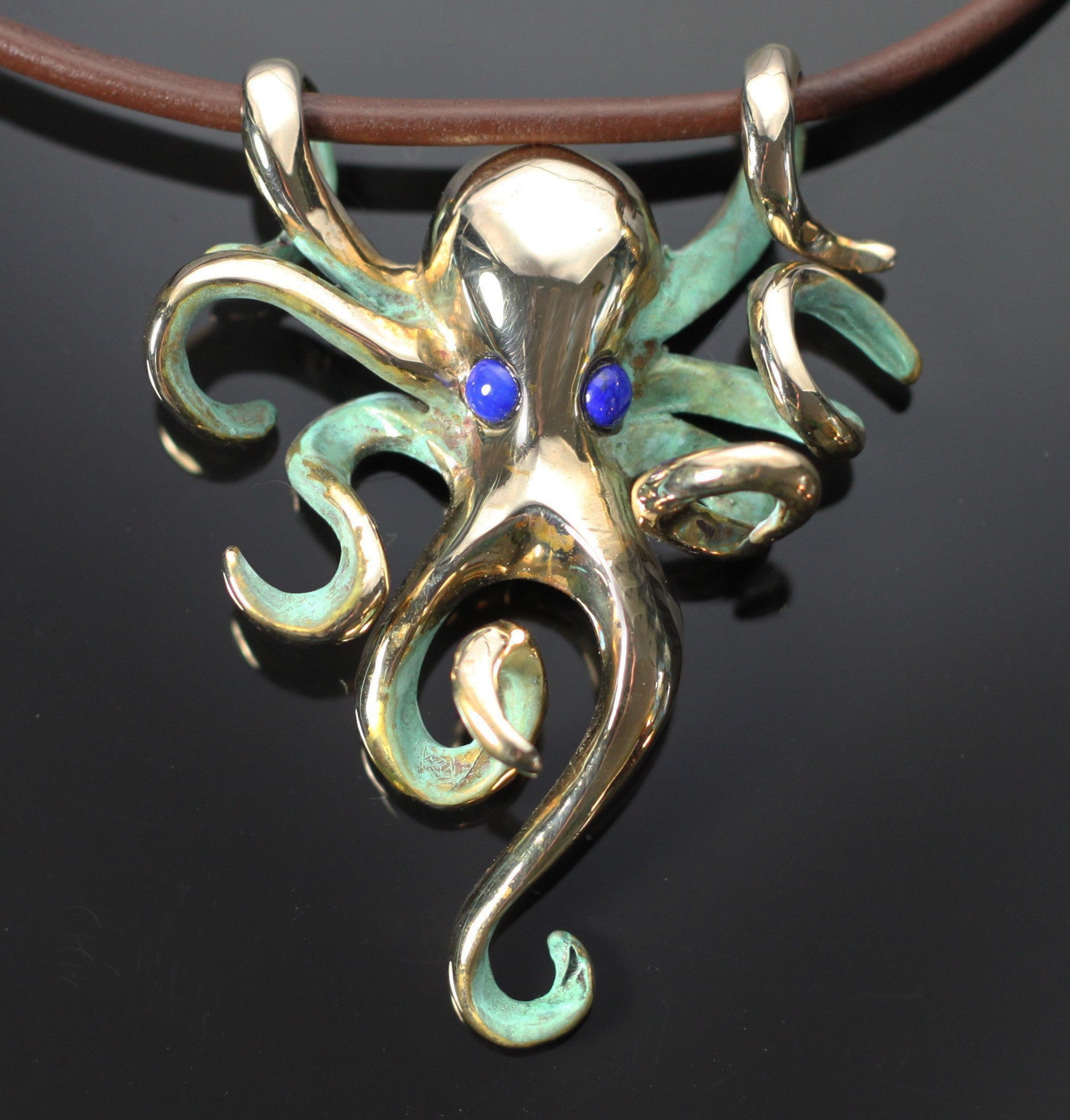 Bronze Octopus Pendant with Lapis Eyes and Green Patina by Anisa Jewelry