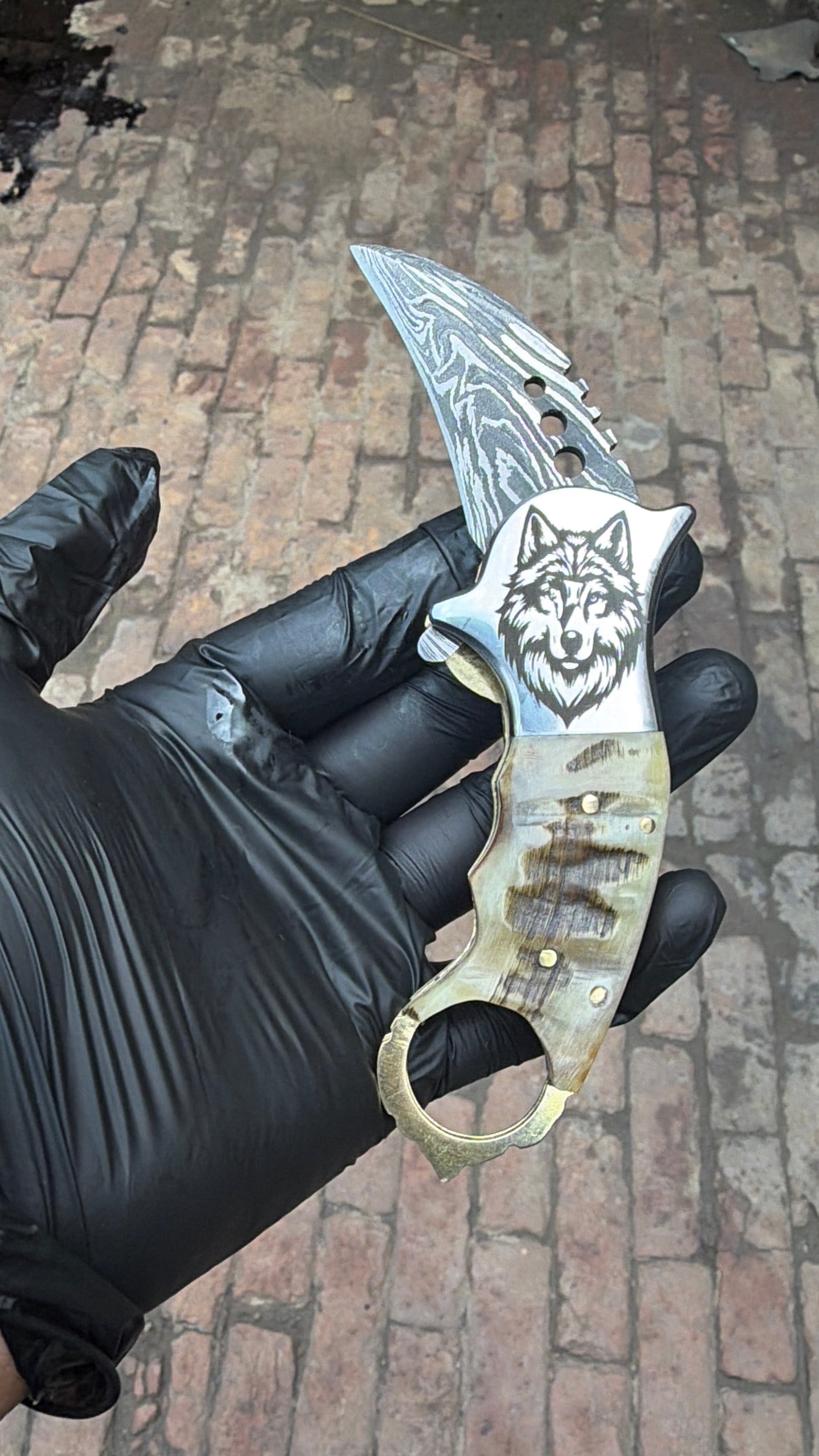 Wolf Claw Damascus Folding Karambit with Engraved Wolf Bolster&nbsp;