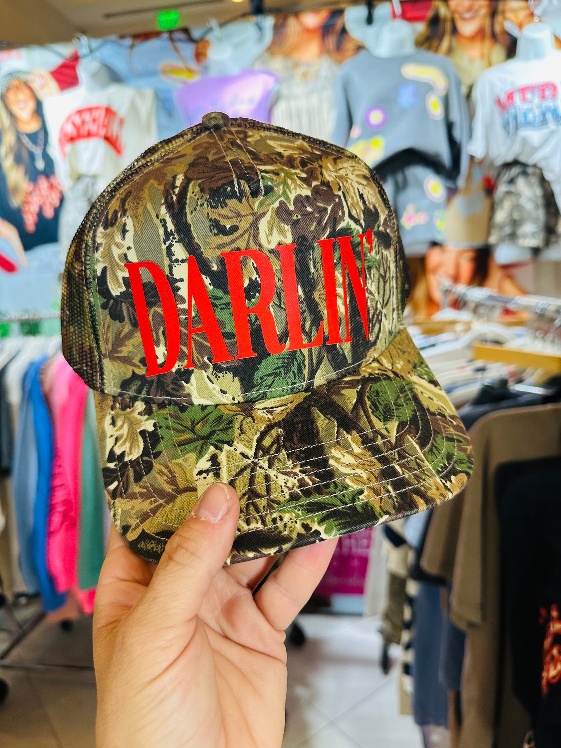 Darlin' (red font) Real Camo Canvas Trucker Hat detail view by Southern Bliss Company
