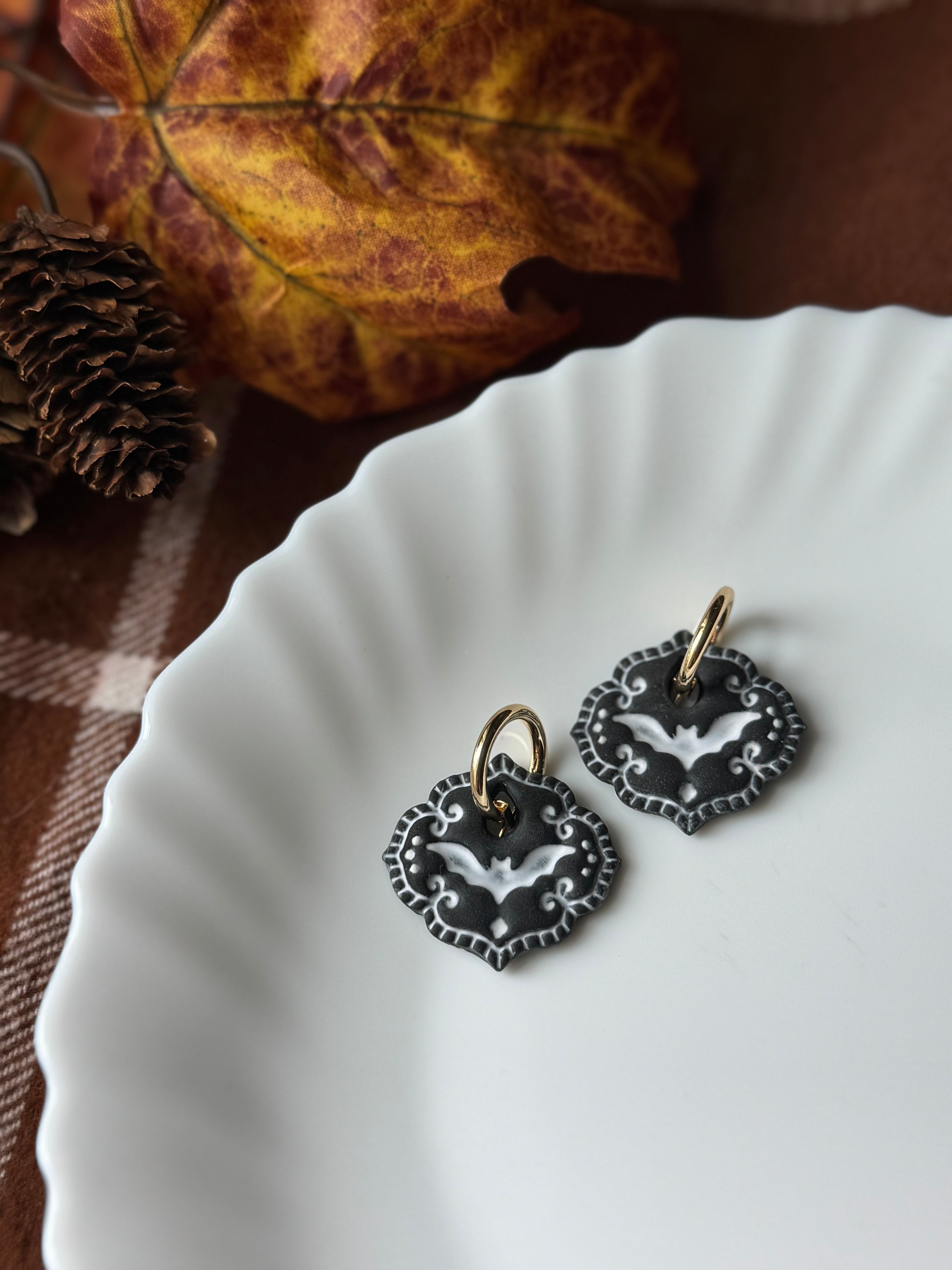Bat Cameo Black handmade polymer clay earrings by Shop Something Earthy — view 1 of 2