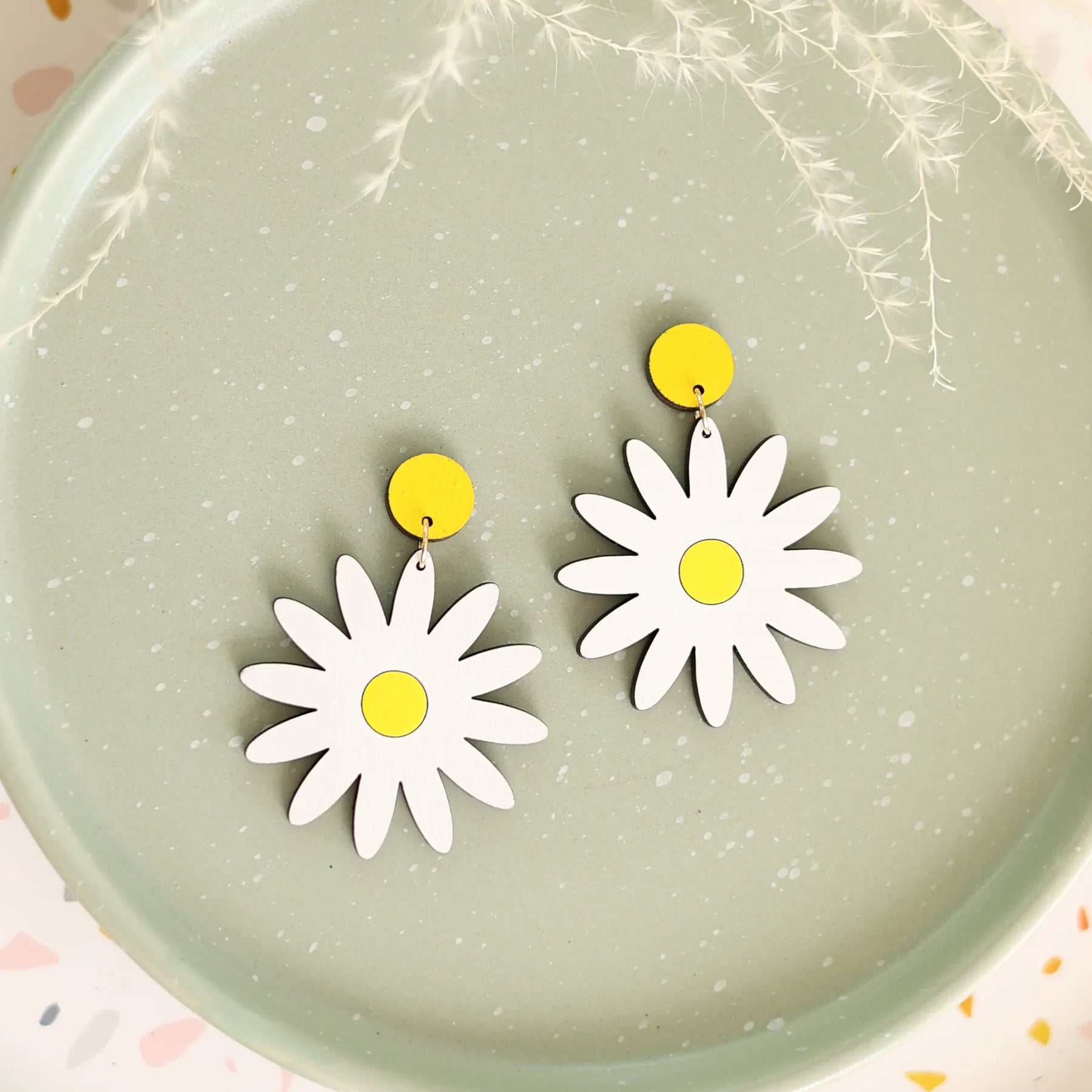 Additional view of Daisy Stud Dangle Earrings hand painted on lightweight wood by LE CHIC MIAMI