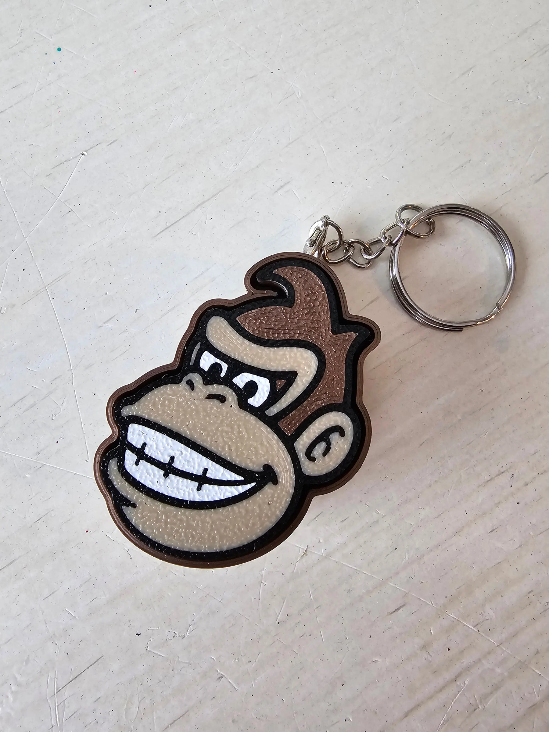 The Tween Space Donkey Kong Inspired Fidget Clicker Keychain | 3D Printed by The Tween Space, paper gift detail photo 2