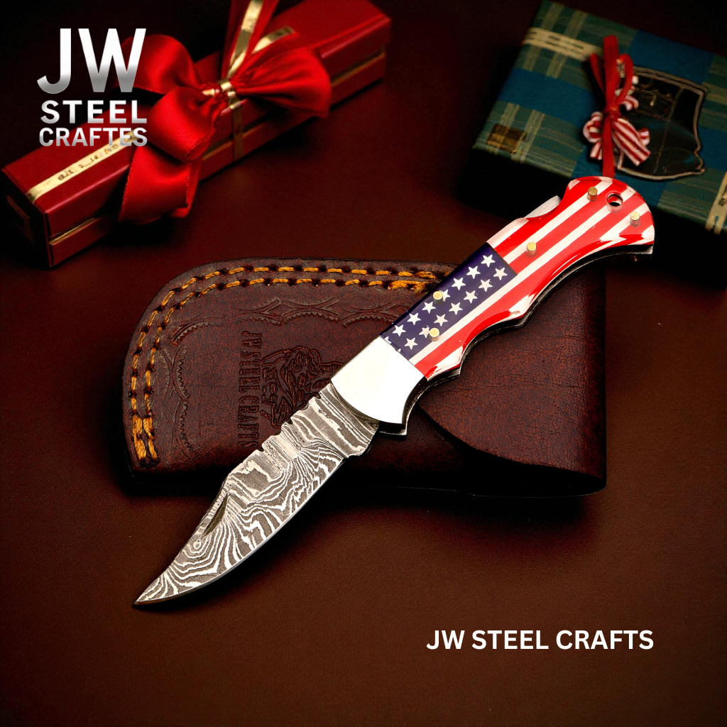 American Flag Damascus Folding Hunter with Ram Horn Handle detail view by JW SteelCrafts