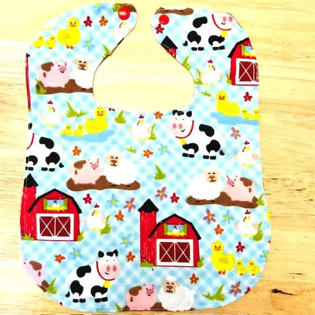 Farm Animal Reversible Bib by East Mississippi Creations, children's boutique clothing main product photo