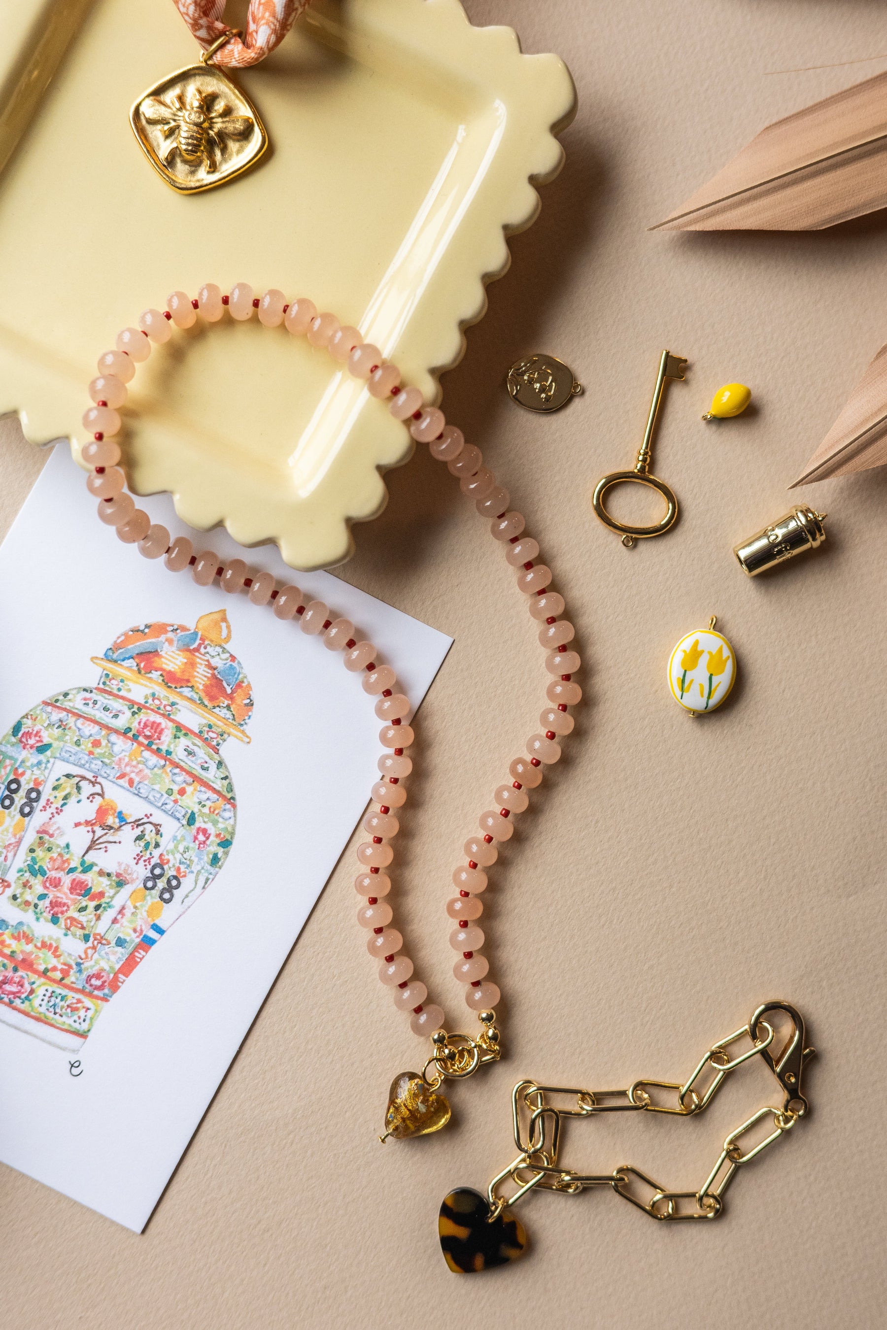 The Emma Beaded Heart Charm Necklace detail view by London Crafted