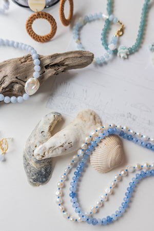 The Bree Pearl and Blue Seed Bead Necklace detail view by London Crafted
