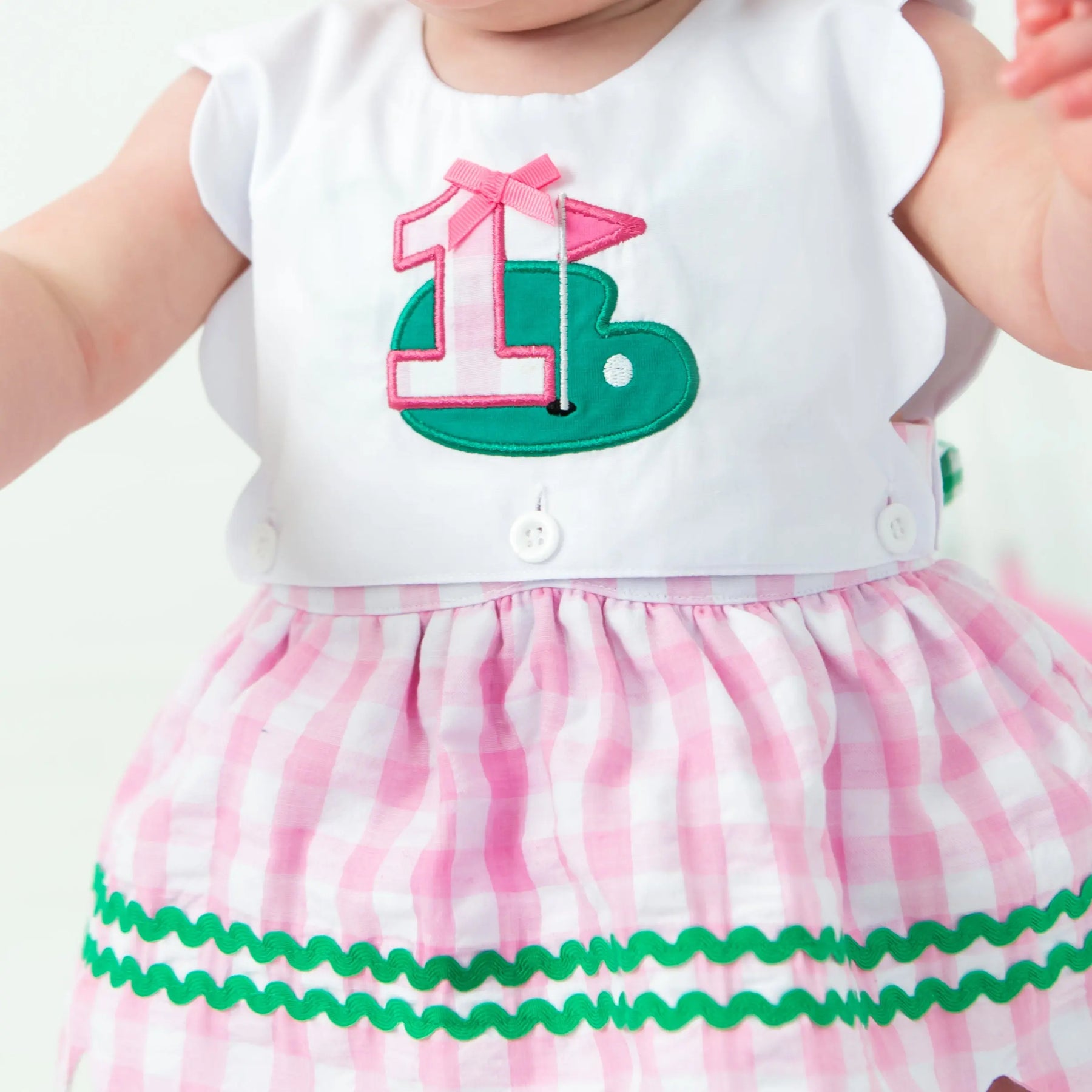 First Birthday Golf Bubble for Girls – Reversible Pink Gingham Skirted Bubble Outfit by Seven Lantern Lane, children's boutique clothing detail photo 6