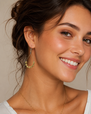 Gold Flower Guitar String Hoop Earrings by N Harmony Jewelry, handmade jewelry detail photo 3