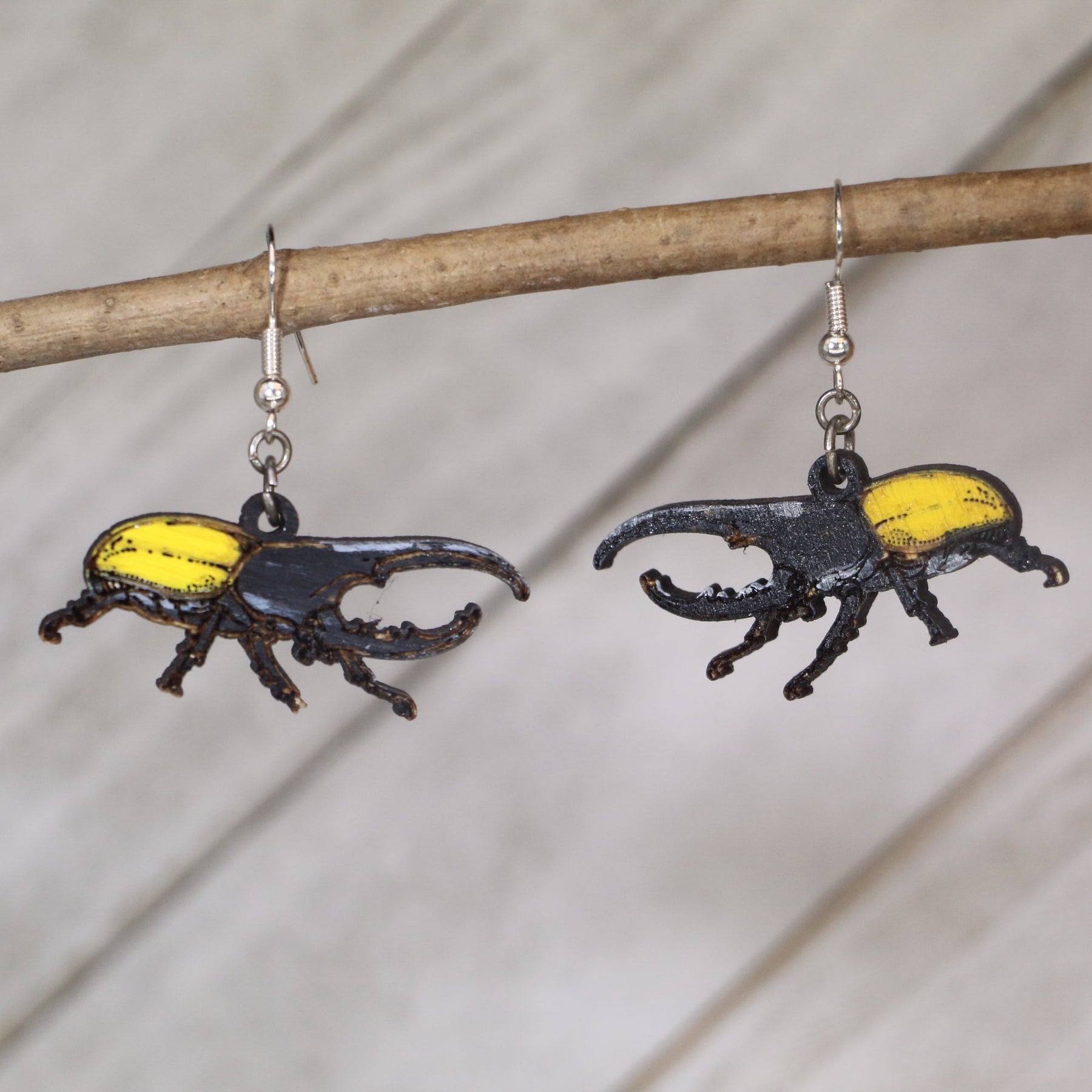 Hercules Beetle Wooden Dangle Earrings | Realistic Insect Jewelry detail view by Cate's Concepts, LLC