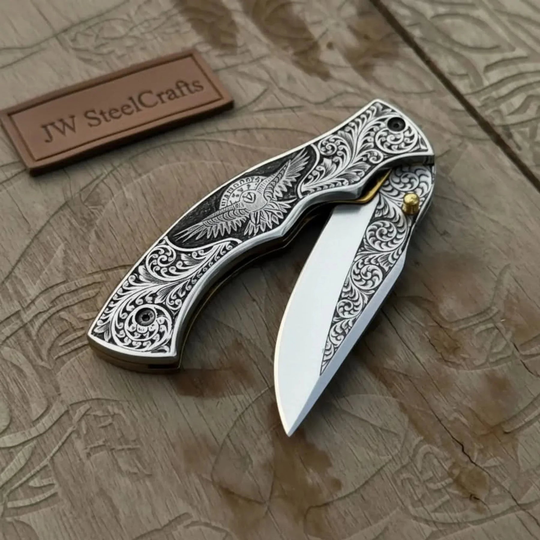 Hand Engraved Neck Folding Knife with Eagle Motif Stainless Steel Scales detail view by JW SteelCrafts