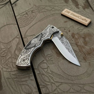 Hand Engraved Neck Folding Knife with Eagle Motif Stainless Steel Scales detail view by JW SteelCrafts