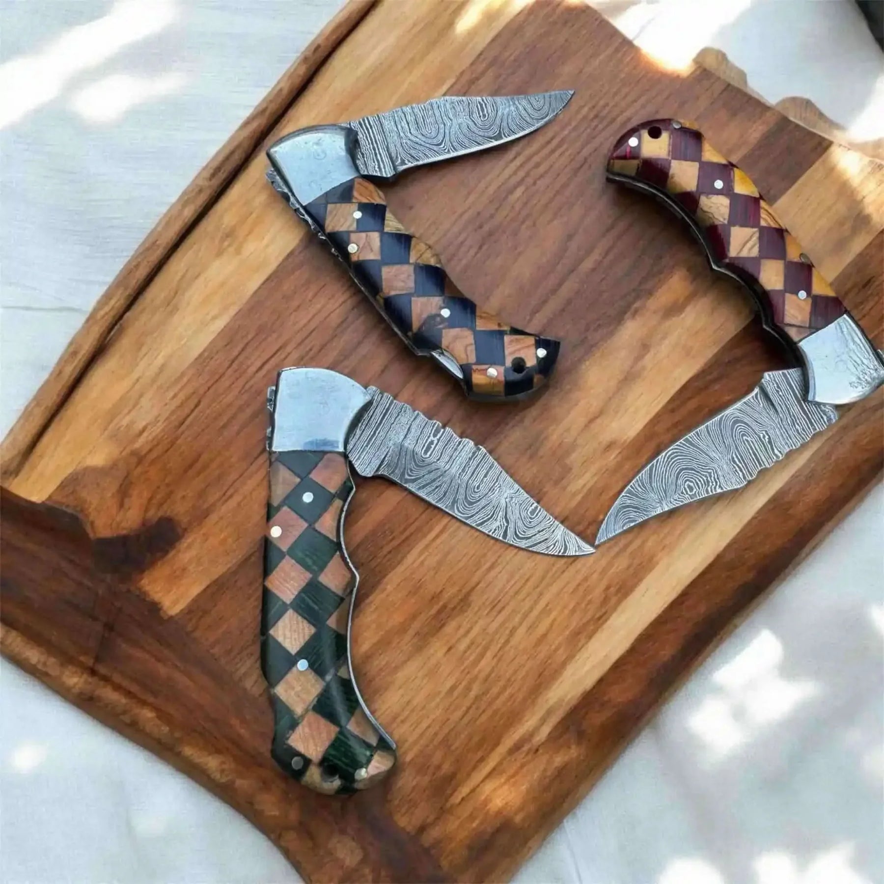 Checkered Damascus Folding Knife Set with Wood Handle detail view by JW SteelCrafts
