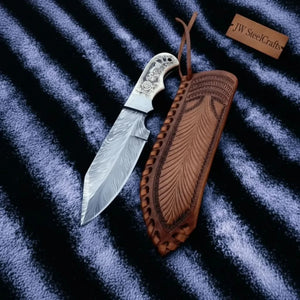 Handmade Damascus Drop Point Hunting Knife with Engraved Bone Handle and Leather Sheath detail view by JW SteelCrafts