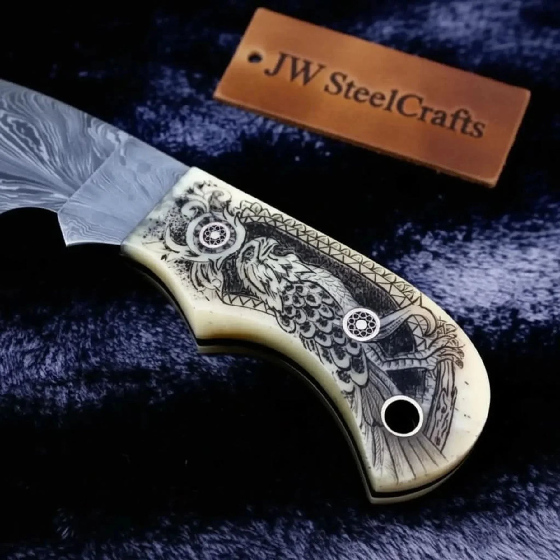 Handmade Damascus Drop Point Hunting Knife with Engraved Bone Handle and Leather Sheath detail view by JW SteelCrafts